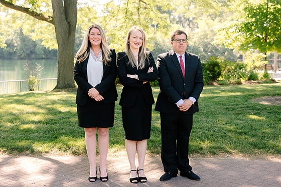 Photo of attorneys Erin Victoria O'Connell, Monika Blacha and Sean Martin McCumber.